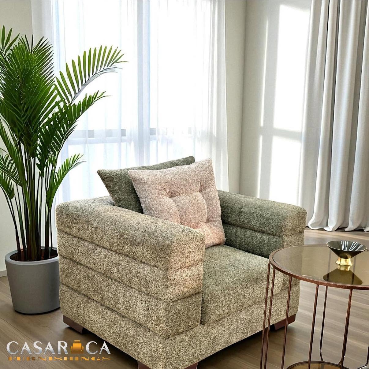 Casarica upholstered armchair and coordinated window layers supplied by the user